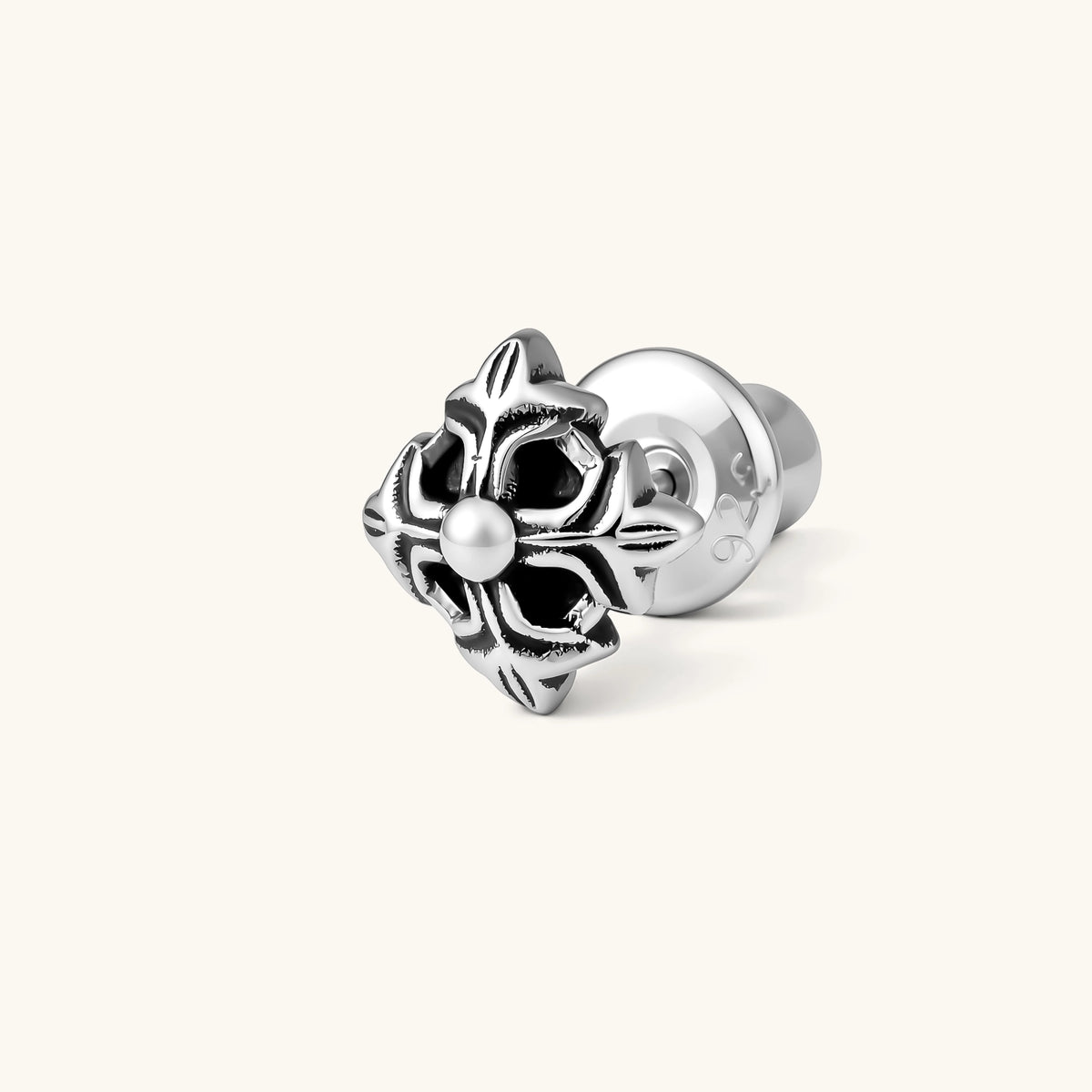 Front view of a 925 sterling silver gothic floral stud earring with oxidized petal detailing and a central dome bead.