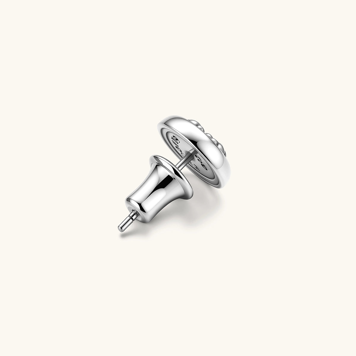 Round sterling silver stud earring with black enamel background and fleur-de-lis cross motif, butterfly push-back closure.