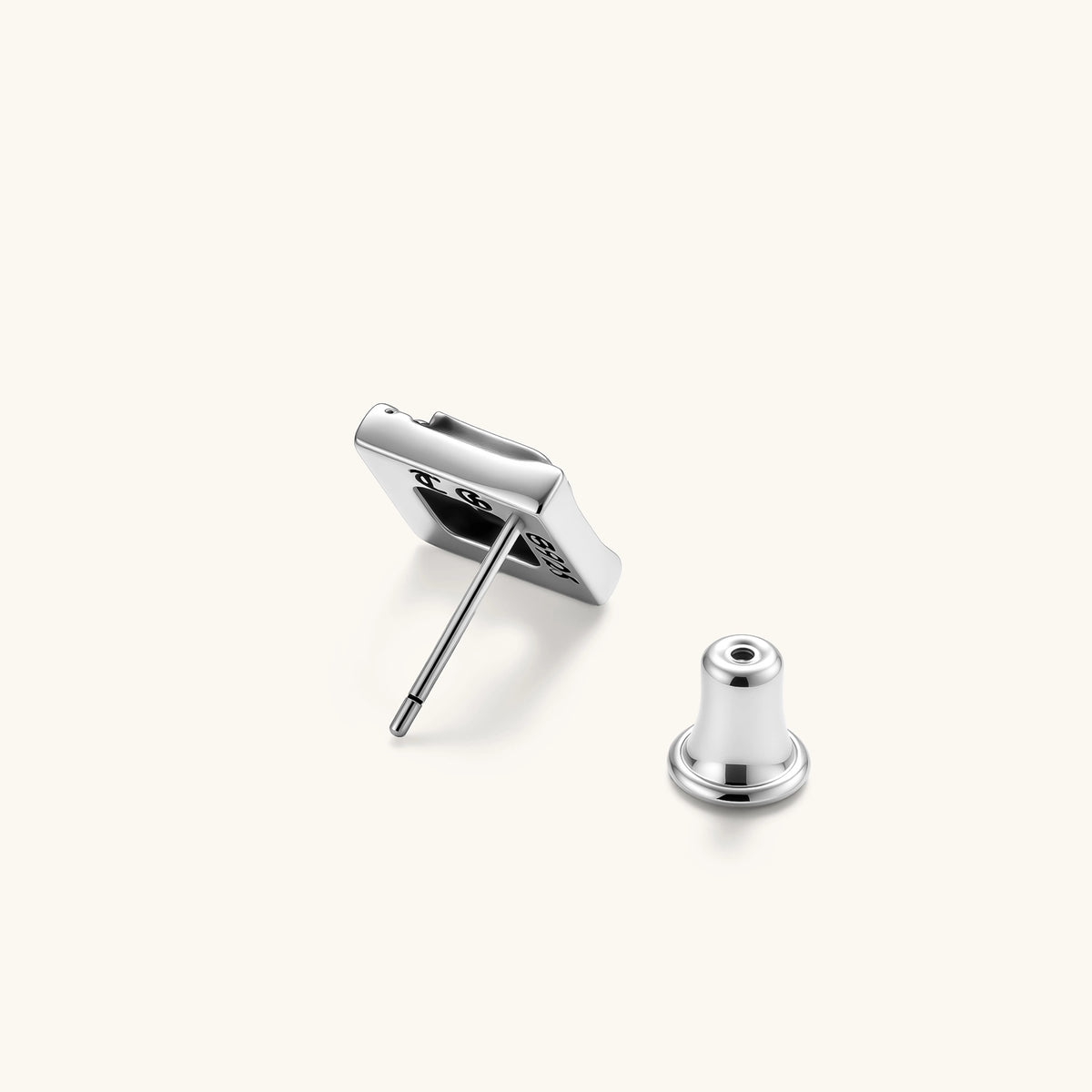 Square 925 sterling silver stud earring with oxidized Gothic letter, ornate dot border, fleur-de-lis corners, butterfly back.