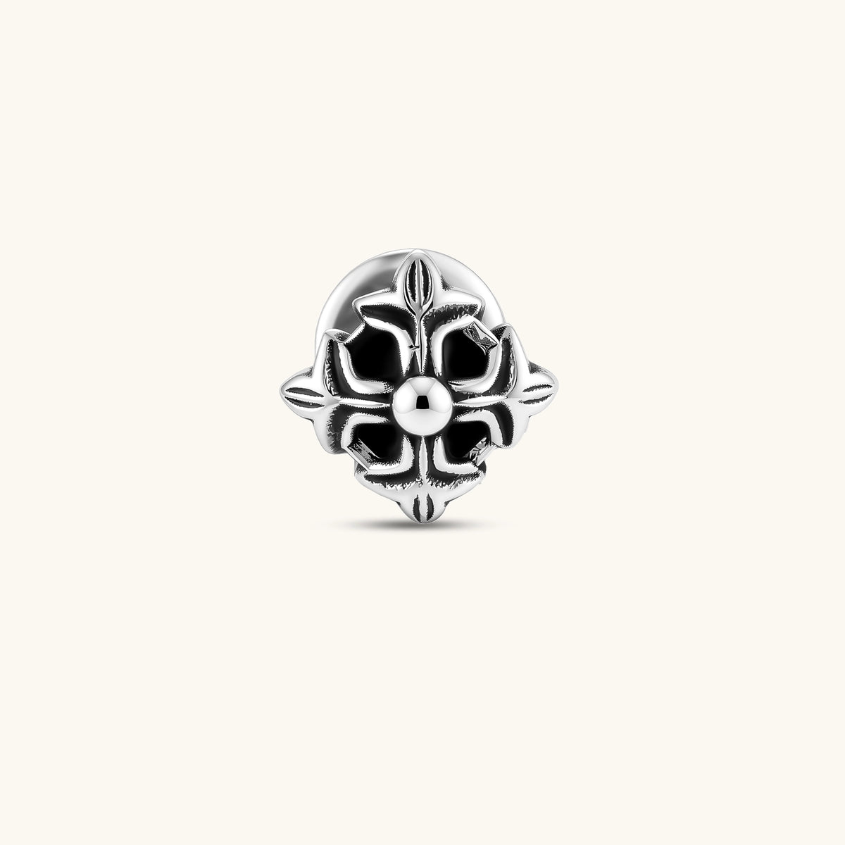 Front view of a 925 sterling silver gothic floral stud earring with oxidized petal detailing and a central dome bead.