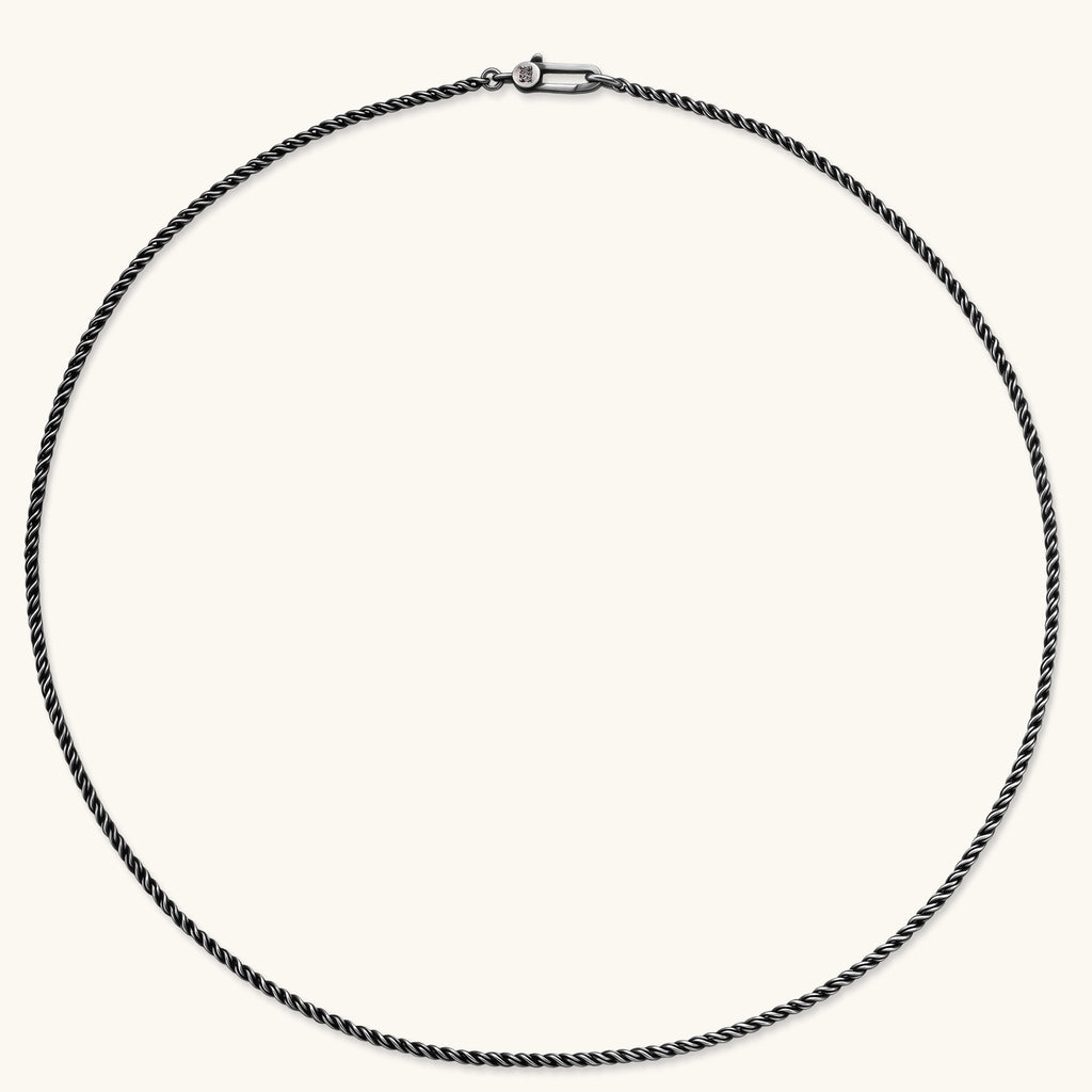 Oxidized 925 sterling silver rope chain necklace, 2.1mm width, carabiner clasp with brand stamp, on cream background.
