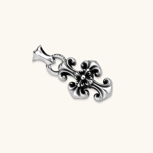 Sterling silver baroque floral cross pendant on a box chain, with oxidized black scrollwork detailing, 45mm length.