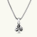925 sterling silver ace-of-spades pendant with oxidized floral engraving, gothic banner script, on a box chain.
