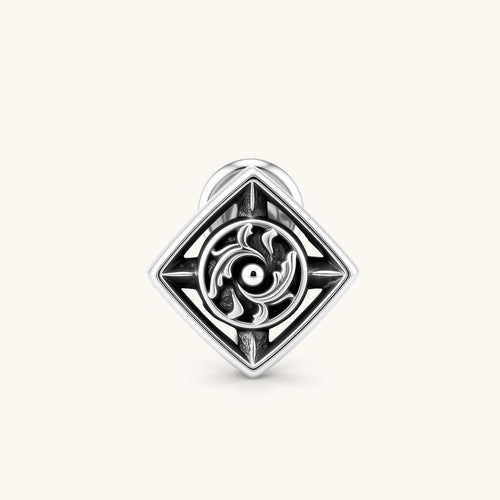 925 sterling silver square stud earring with oxidized black finish, swirling eye motif, and compass spike corners. 9.1mm.