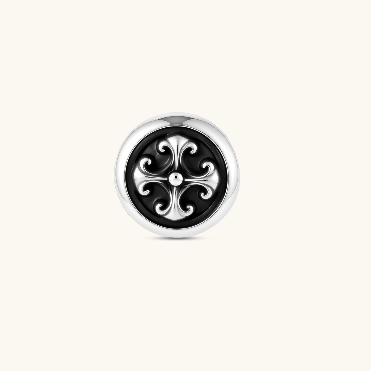 Round sterling silver stud earring with black enamel background and fleur-de-lis cross motif, butterfly push-back closure.