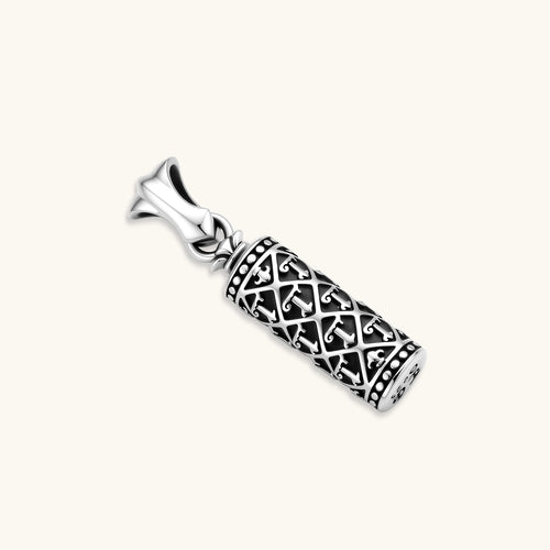 Sterling silver cylindrical pendant with black oxidized anchor lattice pattern on a box chain, 40mm length.