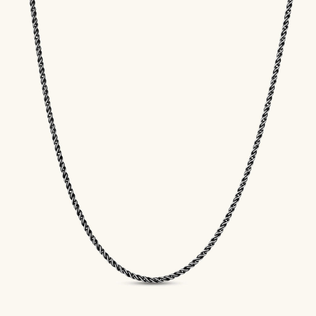 Oxidized 925 sterling silver rope chain necklace, 2.1mm width, carabiner clasp with brand stamp, on cream background.