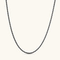 Oxidized 925 sterling silver rope chain necklace, 2.1mm width, carabiner clasp with brand stamp, on cream background.