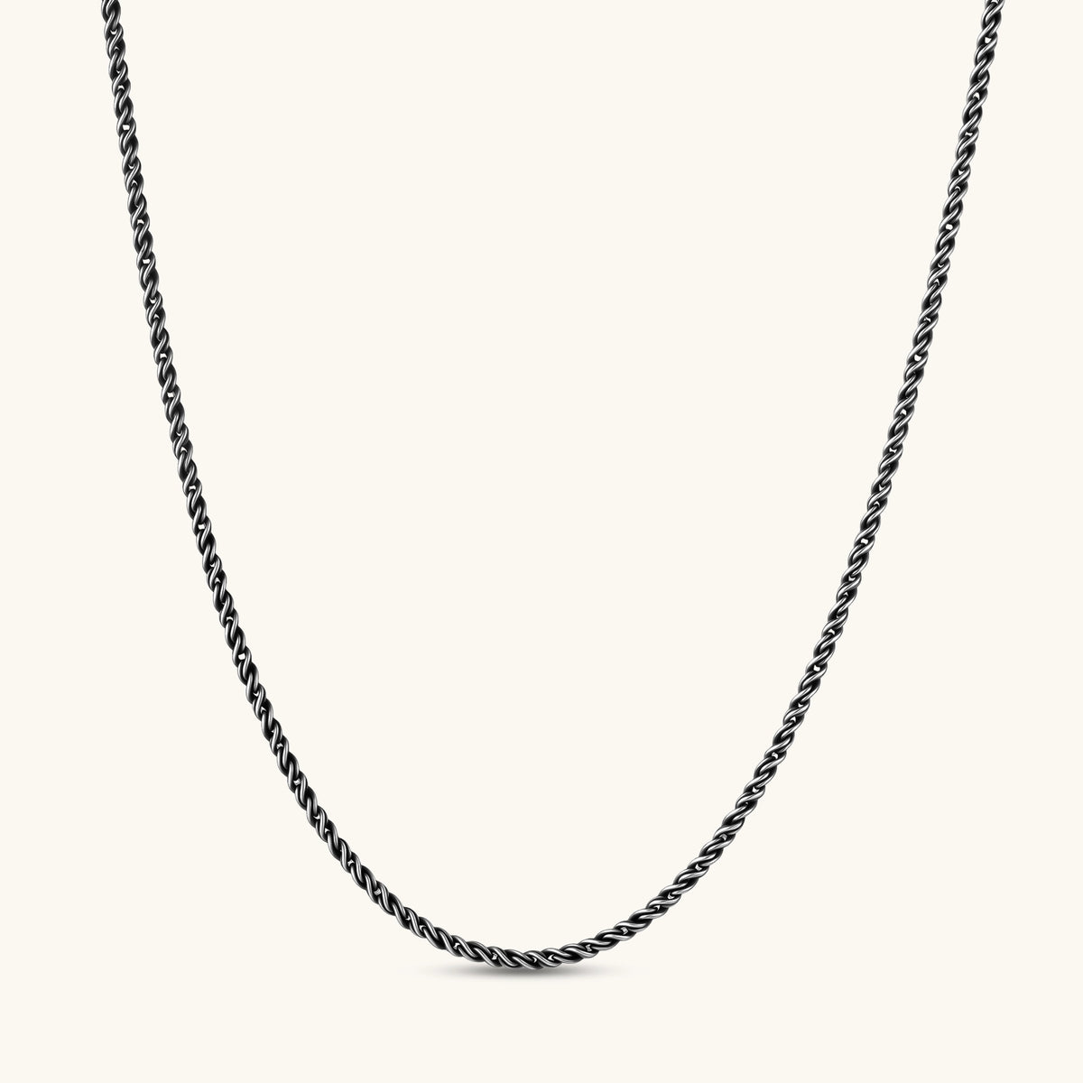 Oxidized 925 sterling silver rope chain necklace, 2.1mm width, carabiner clasp with brand stamp, on cream background.