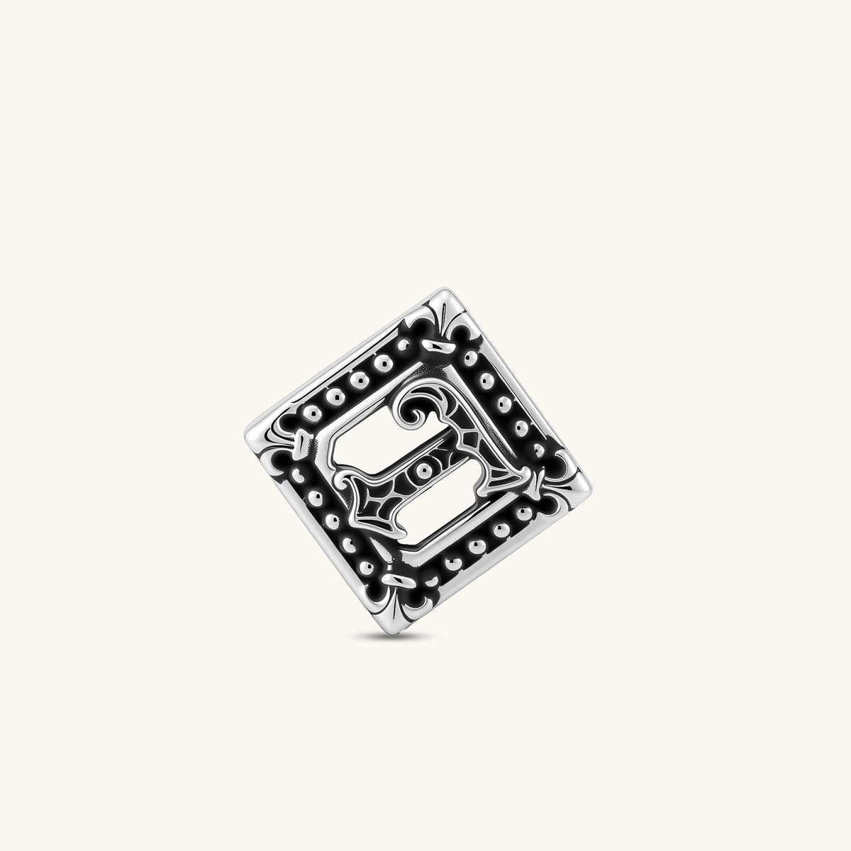 Square 925 sterling silver stud earring with oxidized Gothic letter, ornate dot border, fleur-de-lis corners, butterfly back.