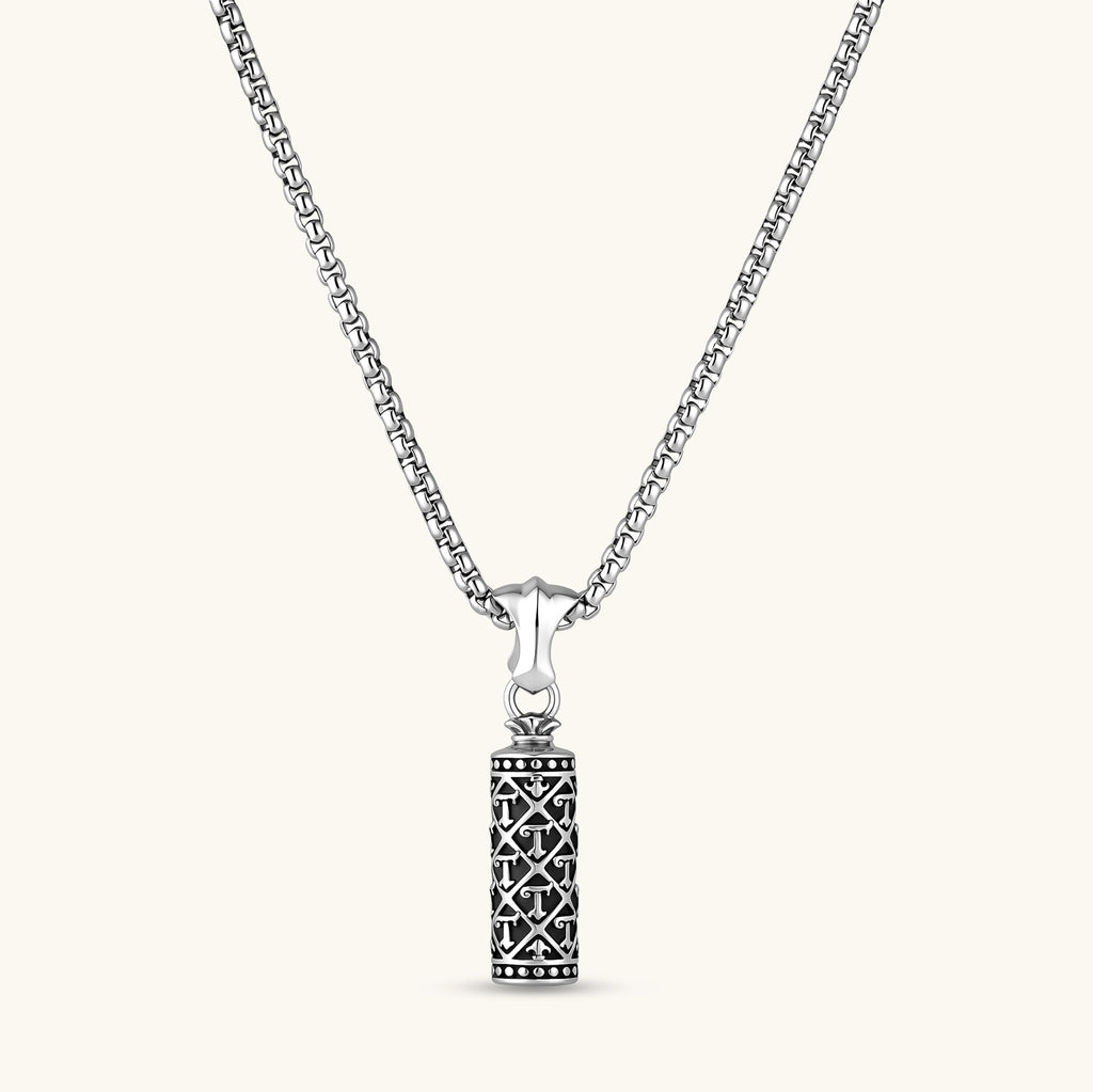 Sterling silver cylindrical pendant with black oxidized anchor lattice pattern on a box chain, 40mm length.