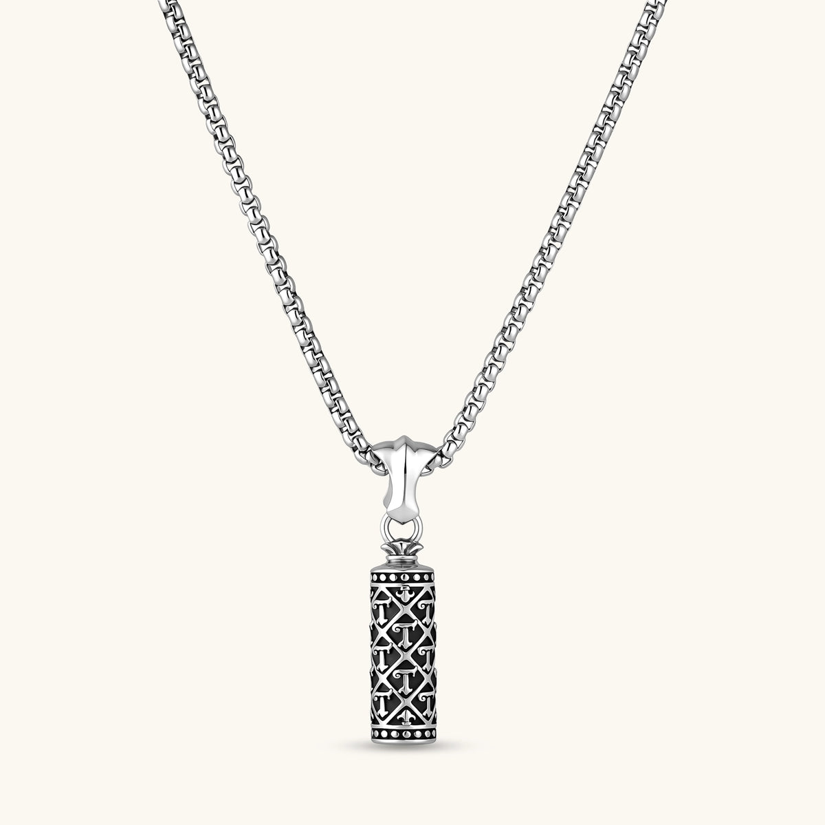 Sterling silver cylindrical pendant with black oxidized anchor lattice pattern on a box chain, 40mm length.